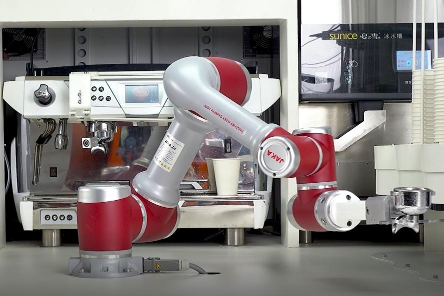 A robot barista inside an automated coffee station